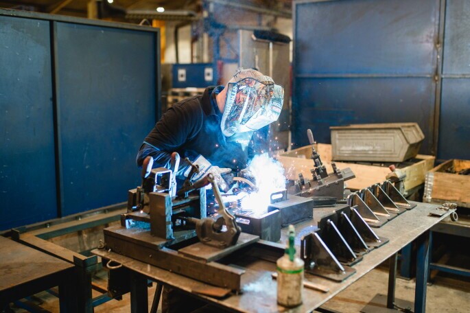 Schweißer und Schlosser*, 1. Bild